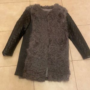 New beautiful jacket with leather sleeves